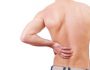 Болевой синдром сзади слева внизу спины: причины, диагностика и лечение